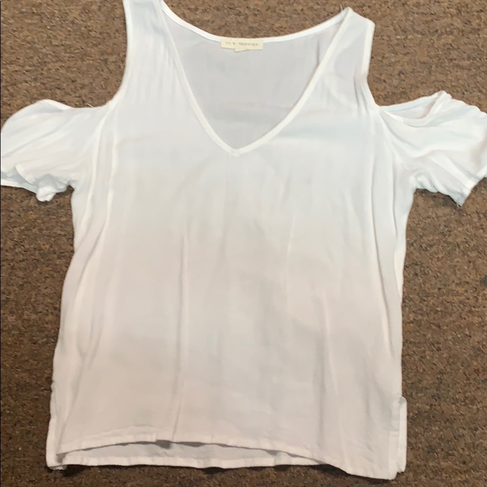 white flowy shoulderless top